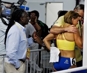 Sommar-OS 2008 Peking, friidrott, 100m häck, damer semifinal. Susanna Kallur, Sverige, med Björn Folin, SOK.